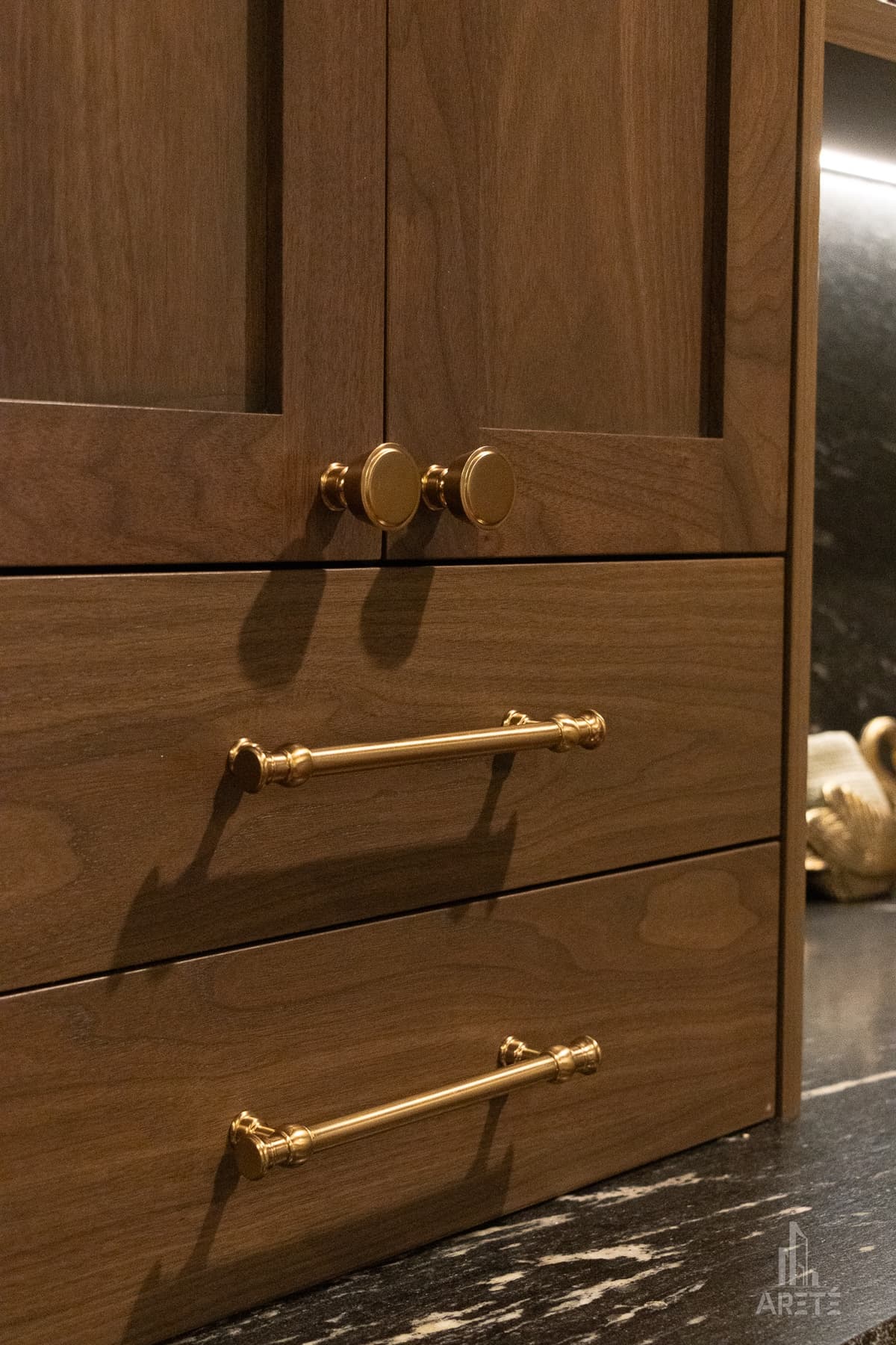 Finished basement built-in cabinetry with storage drawers