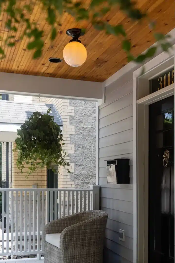siding installation process showing proper spacing and flashing